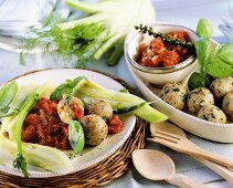 Basil dumplings with fennel and tomato sauce