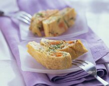 Omelette roll with vegetable filling