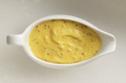 Mustard sauce in a sauce boat