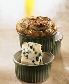 Roquefort and walnut soufflé in green baking dish