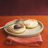 Puff pastry tart with fruit and icing sugar