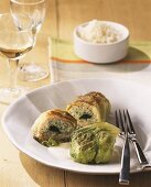 Savoy cabbage roulade with salmon and cod
