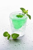 Ice glass with mint liqueur