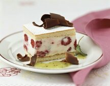 Raspberry slice with chocolate curls