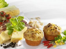 Hearty muffins, surrounded by ingredients