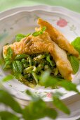 Deep-fried cod fillets with minted cabbage salad