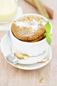 Rhubarb soufflé dusted with icing sugar