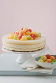 Yoghurt cheesecake with different coloured melon balls