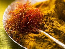 Spices for pasta and rice (saffron threads and curry powder)