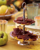 Quince jelly sweets on silver stand, with autumn leaves