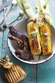 Grilled lamb chops and corn on the cob (South Africa)