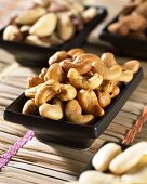 Toasted cashew nuts in dishes