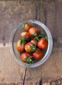 Tomatoes, variety 'Black Plum', in glass dish