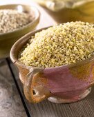 Buckwheat grains in terracotta pot