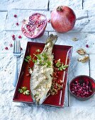 Trout with pomegranate and walnut stuffing