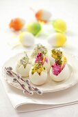 Eggs stuffed with coloured cream cheese for Easter