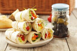 Wraps and pickled olives for a picnic
