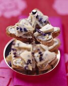 Gorgonzola spread with lavender flowers on toasted walnut bread