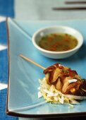 Satay with bacon and coconut chilli sauce