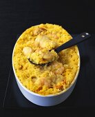 Baked saffron rice with shrimps and scallops
