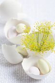 Sugar eggs and dill in eggshells