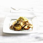 Trout fillets with aubergine, garlic and tabbouleh