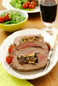 Beef fillet stuffed with mushrooms and dried tomatoes
