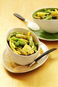 Pork curry with yellow wax beans and peas