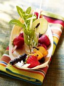 Fruit skewers with fresh mint