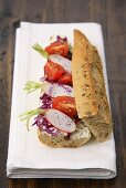 Red cabbage, radish and tomato sandwich