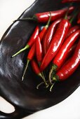 Red chillies in wooden bowl