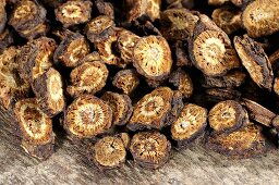 Dried Chinese goldthread root (Huang Lian, China) on wooden background