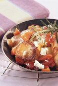 Mediterranean pan-cooked potato dish with peppers and feta