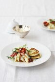 Asparagus with tomatoes and ricotta pancakes