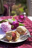 Rhubarb pies on plate with peonies