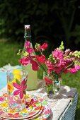 Lemonade and flowers on picnic basket