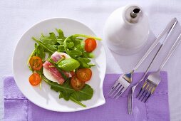 Mozzarella with Parma ham, tomatoes, basil and rocket