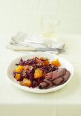 Red cabbage and persimmon salad with roast beef