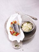 Sea bass and vegetables en papillote with courgette risotto