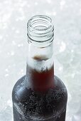 Amaro herbal liqueur in icy bottle
