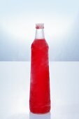 Red vodka in bottle
