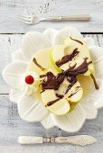 Pear with amond sauce and chocolate