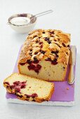 Cherry loaf cake, partly sliced