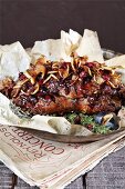 Roast pork with cranberries and caramelised apple slices