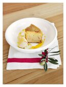 Saffron cake with olive oil served with mascarpone