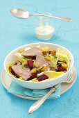 Roast beef salad with chicory, beetroot and gherkins