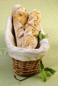 Herb baguettes in a bread basket