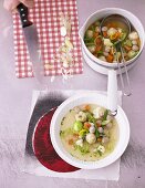 Clear broth with vegetables and dumplings