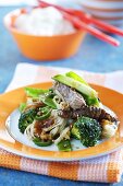 Beef with soba noodles, broccoli, ginger and sesame