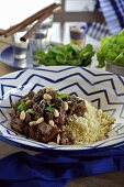 Lamb ragout with almonds and couscous